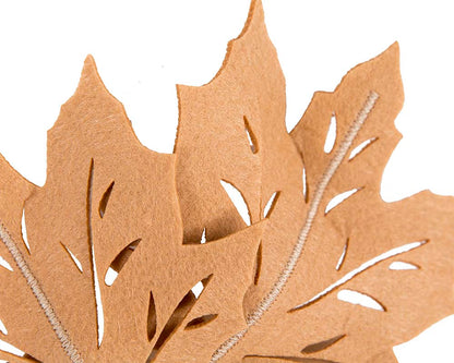Beige laser cut maple leafs on headband