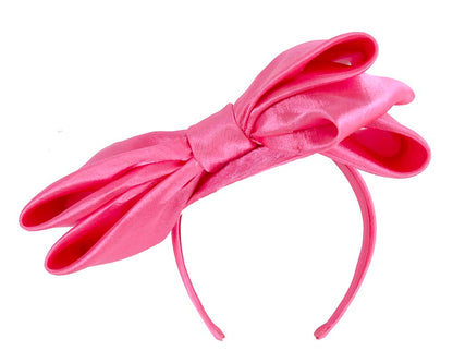 Fuchsia fascinator with big bow by Max Alexander