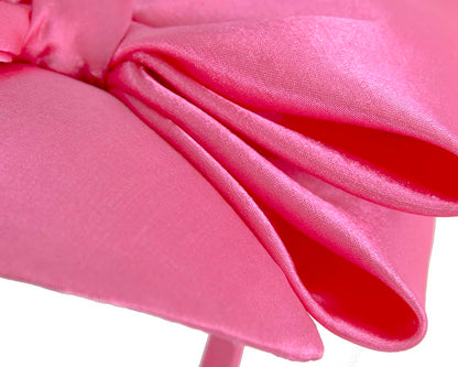 Fuchsia fascinator with big bow by Max Alexander