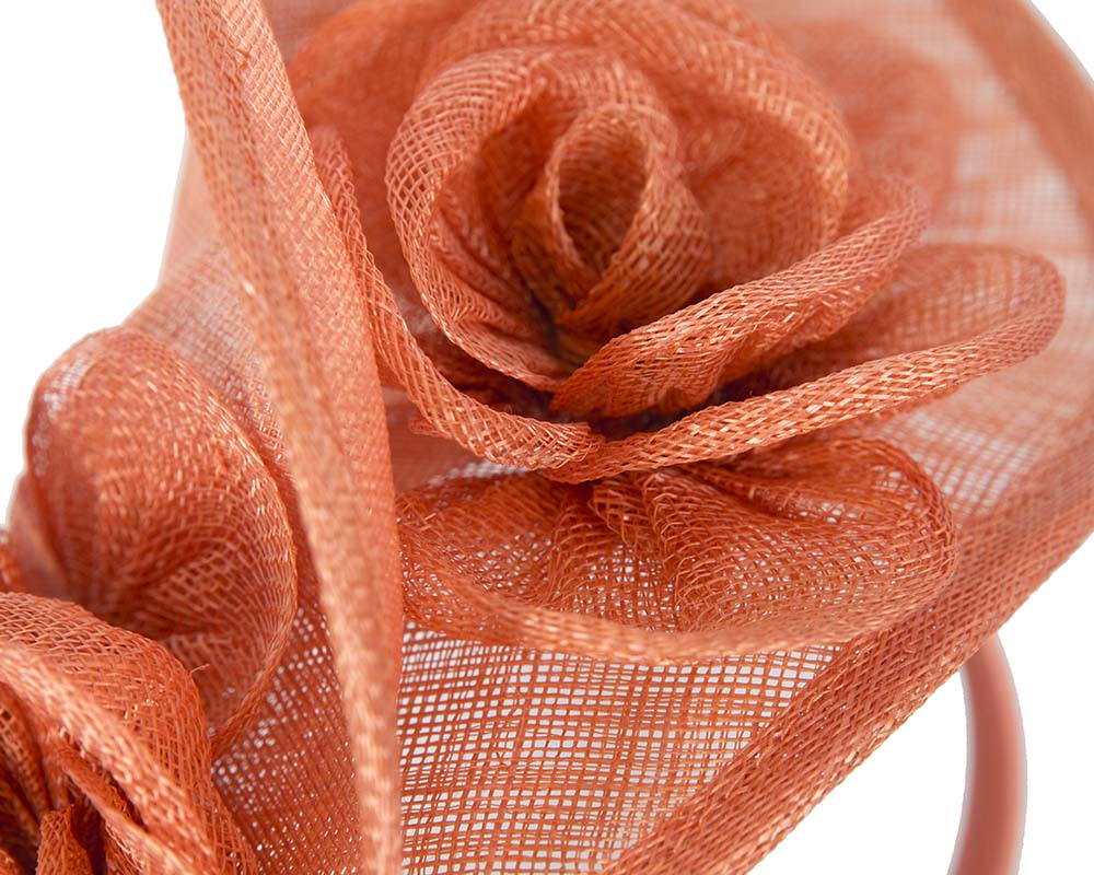 Tall burnt orange sinamay fascinator by Max Alexander