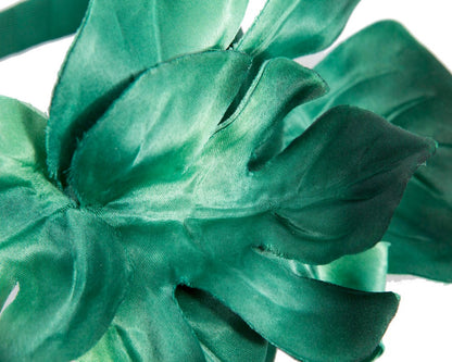 Green monstera leaves fascinator by Max Alexander