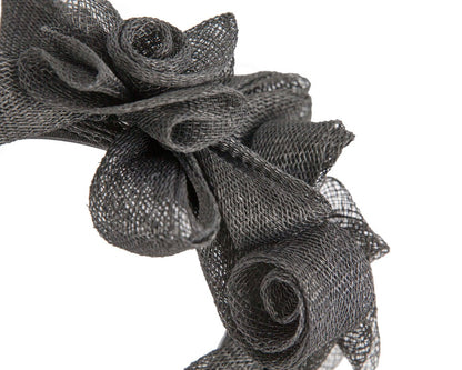 Black curly sinamay fascinator by Max Alexander