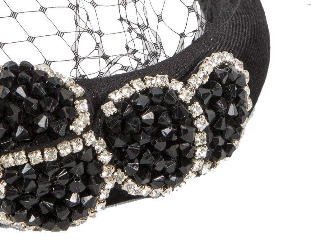 Black headband with face veil by Max Alexander