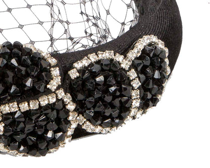 Black headband with face veil by Max Alexander