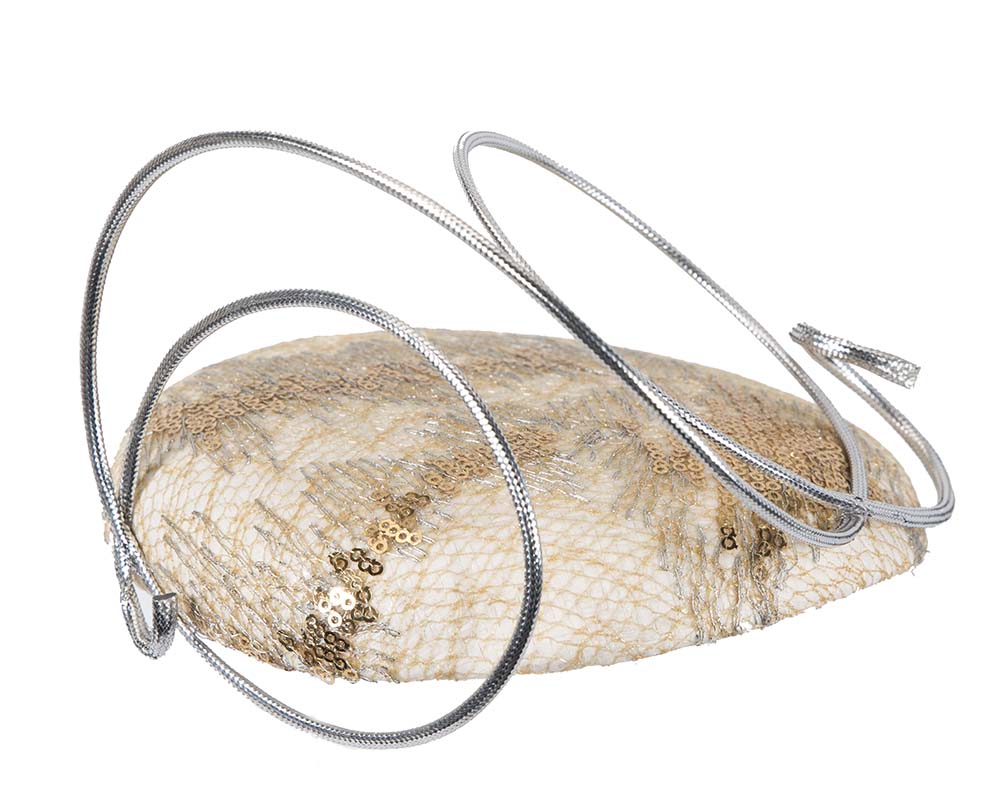 Bespoke designers cream & silver fascinator