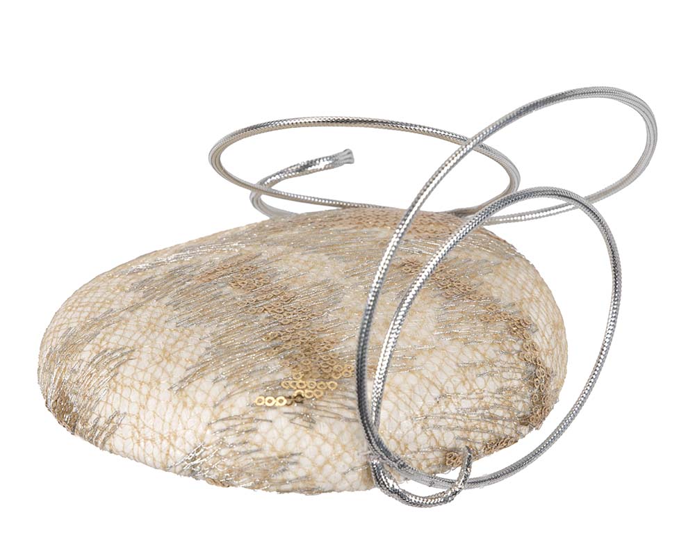 Bespoke designers cream & silver fascinator