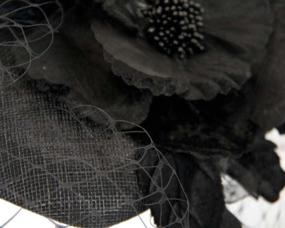 Black pillbox with flower & veil by Fillies Collection