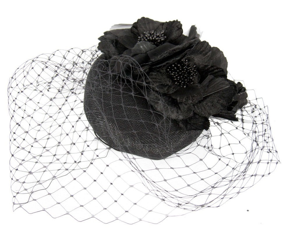 Black pillbox with flower & veil by Fillies Collection