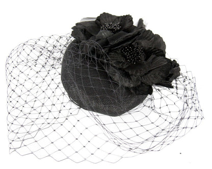 Black pillbox with flower & veil by Fillies Collection