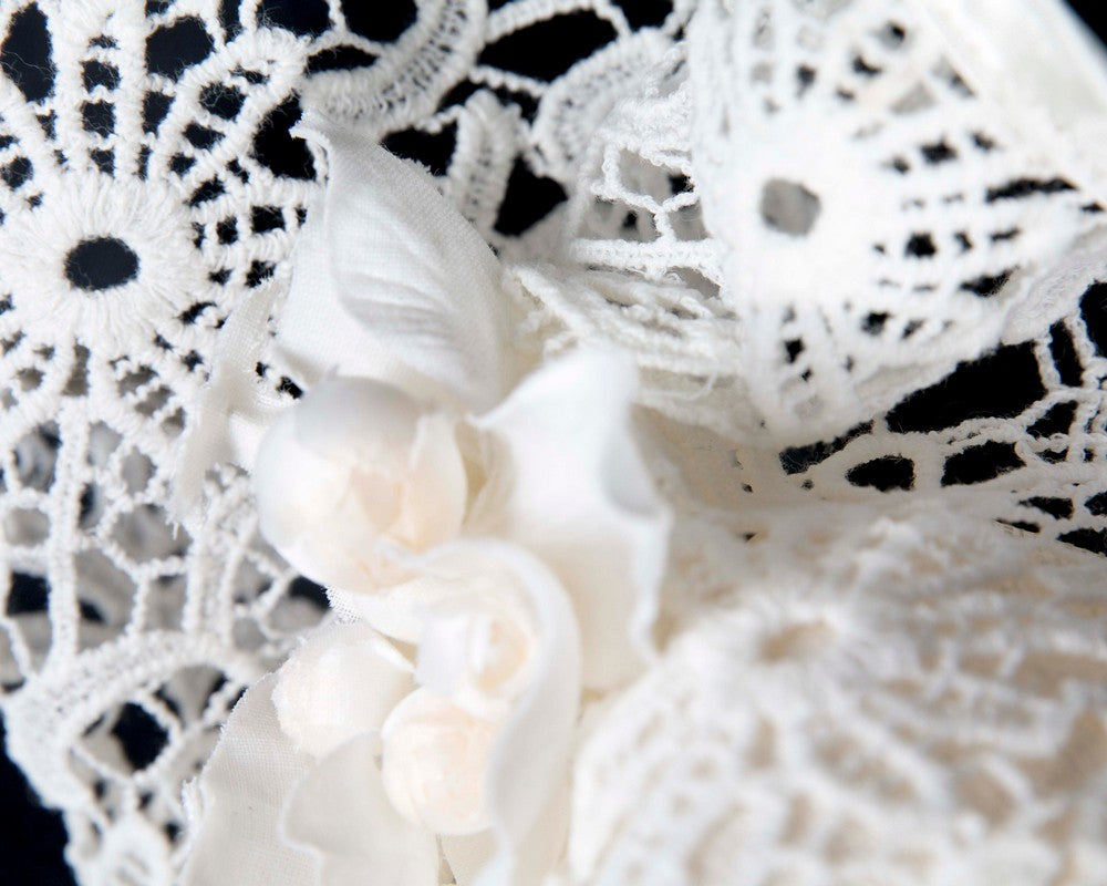 Cream lace covered pillbox fascinator