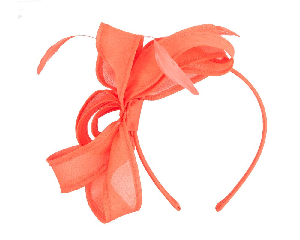 Orange organza fascinator by Max Alexander