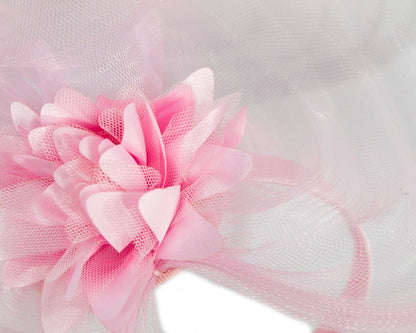 Pink crinoline and flower fascinator