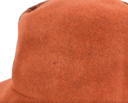 Exclusive orange bucket hat with leather trim