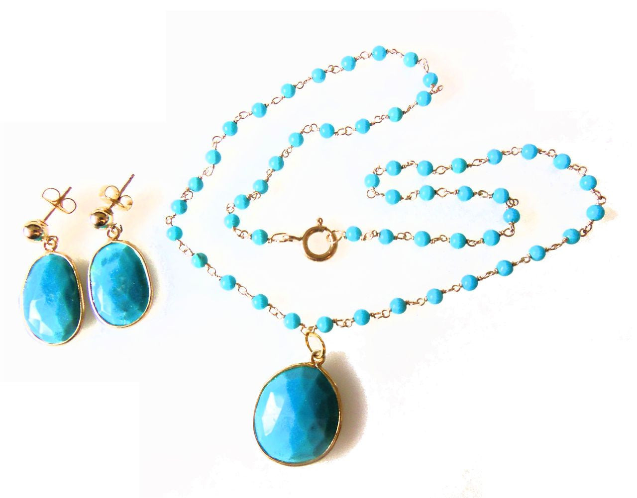 Turquoise pendant on beaded twisted wire necklace.